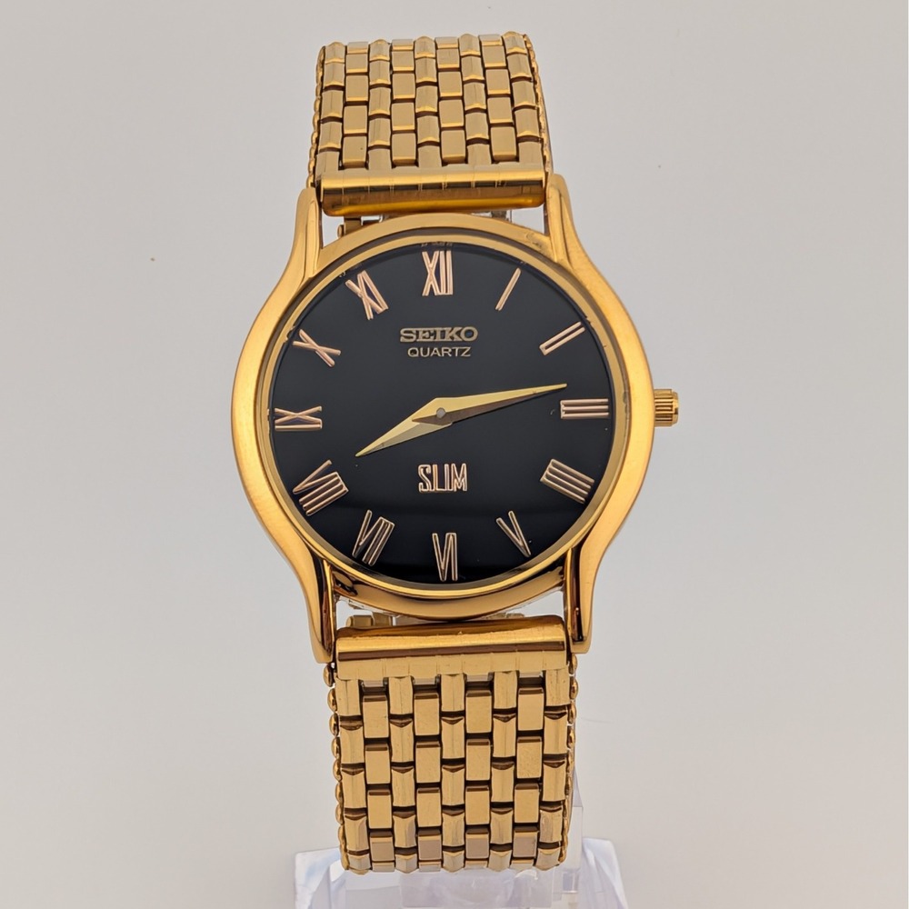 Vintage Seiko Slim Quartz S0.325714 Black Dial Gold Tone Roman Numeral Watch‎